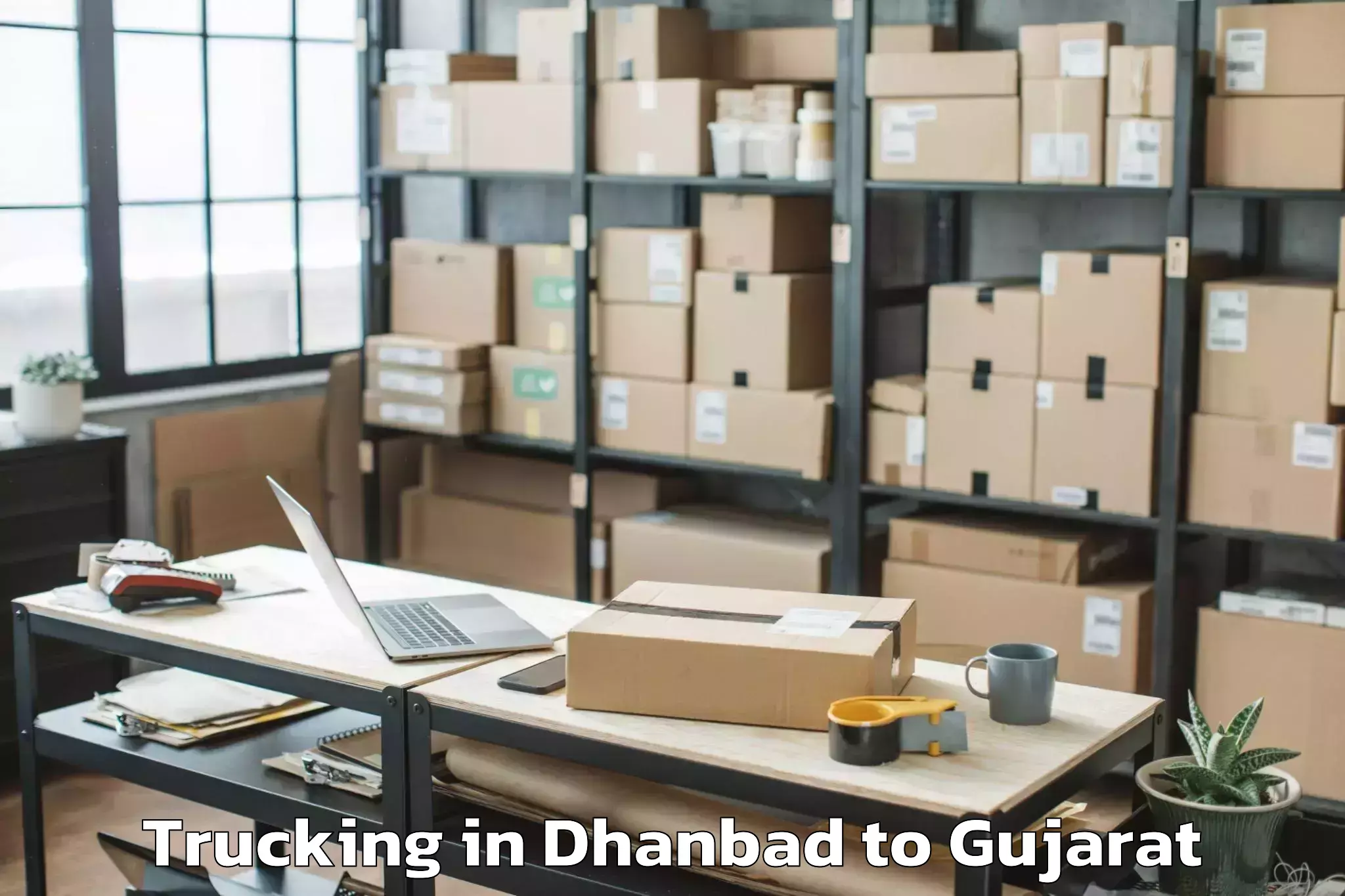 Hassle-Free Dhanbad to Harij Trucking